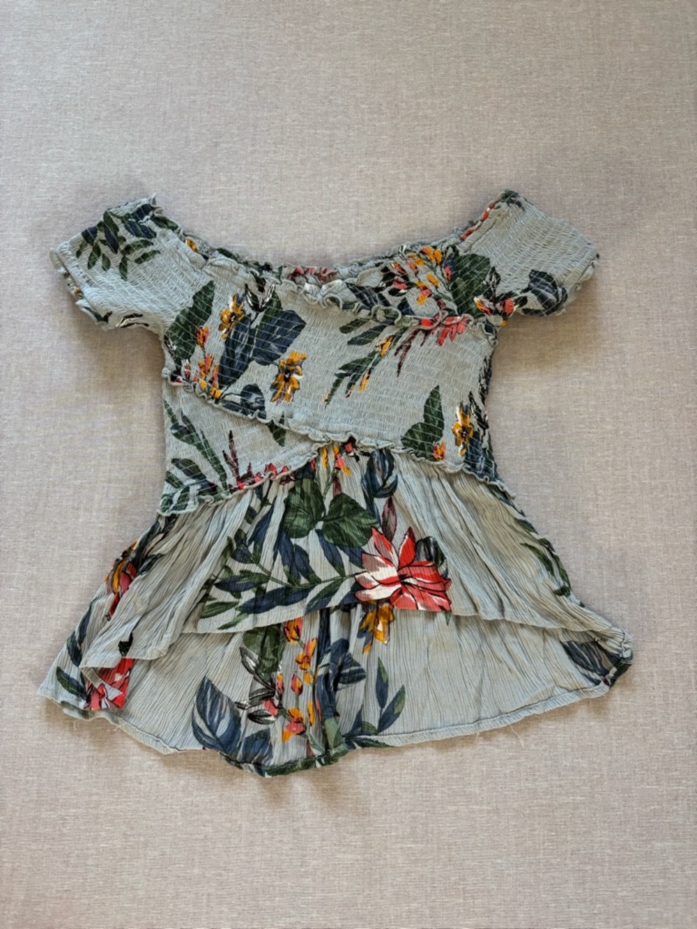 Patrons of Peace floral smocked top.